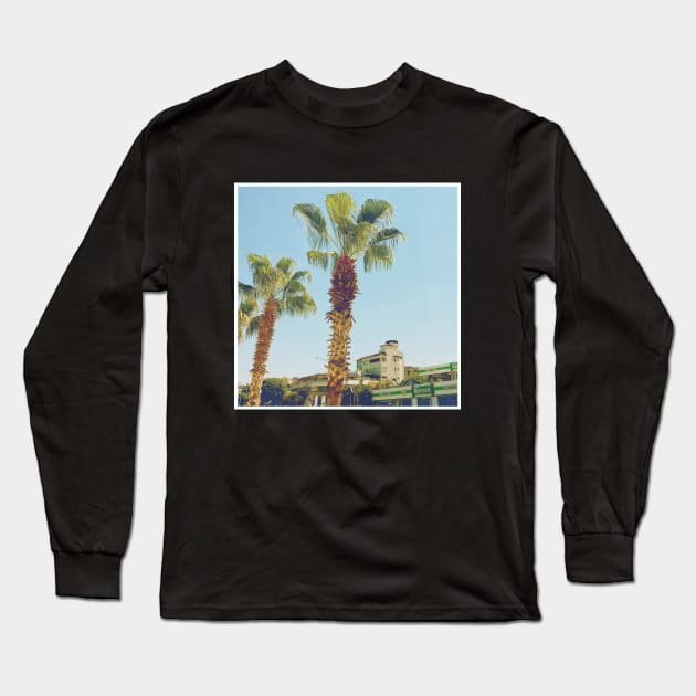 Pretty picture of a Palm Tree. Pretty Palm Trees Photography design with blue sky Long Sleeve T-Shirt by BoogieCreates